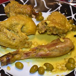 Faraona con curcuma, pinoli e olive